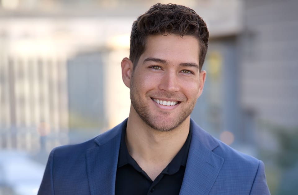 Corporate headshots of a smiling professional in a blue blazer