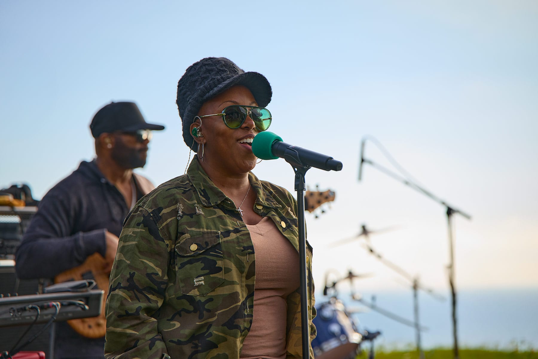 Los Angeles event photographer capturing a live singer performing on an outdoor stage