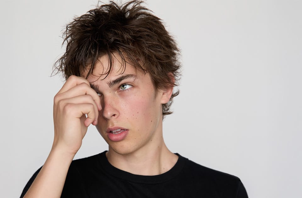 Example of modeling digitals: full-length and closeup of male model in fitted black t-shirt on plain background