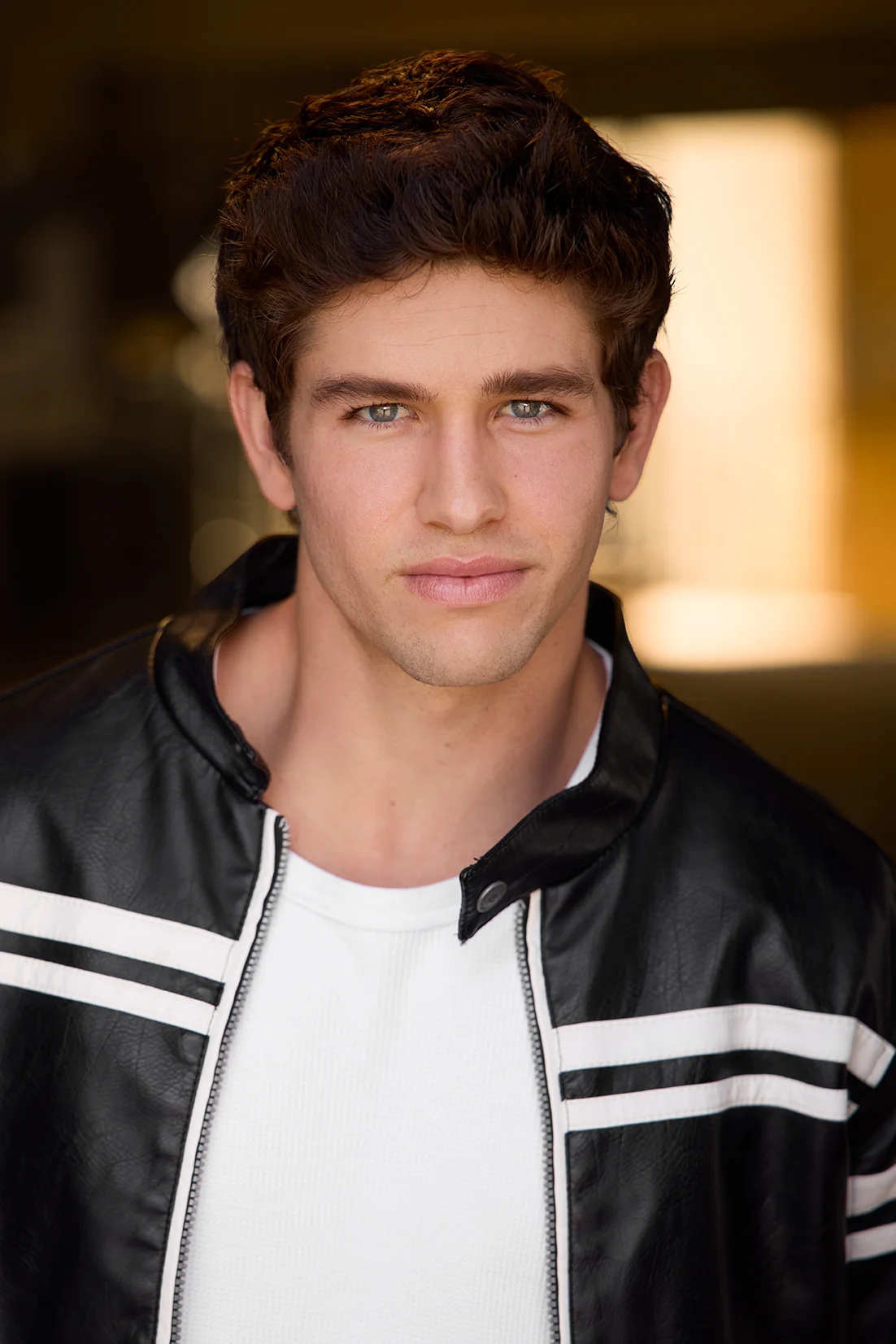 Male headshot of a professional man in business attire, photographed in Los Angeles by Headshots LA.
